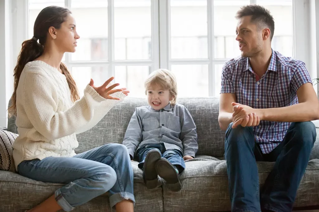 Child at the center of parents arguing