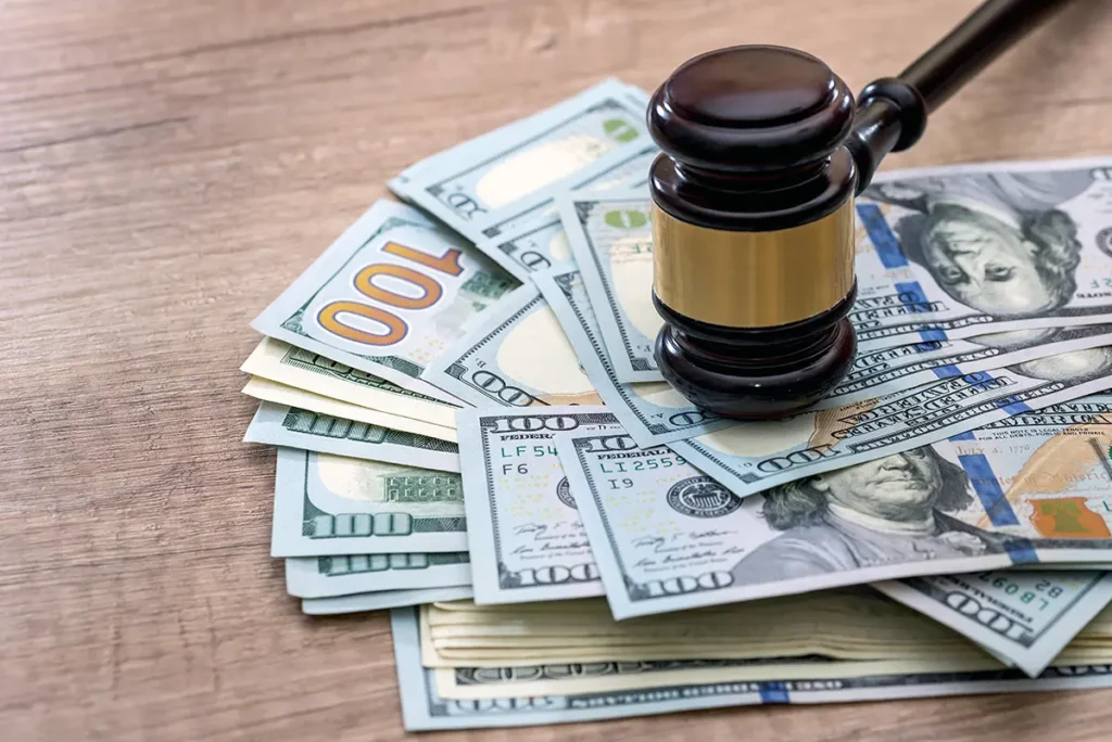 Wooden Gavel with Dollars, Divorce and Money