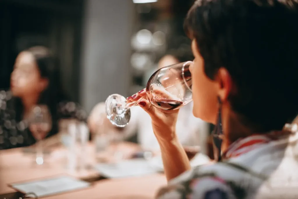 Woman Drinking Wine - Law Offices of Patrick Markey Chicago